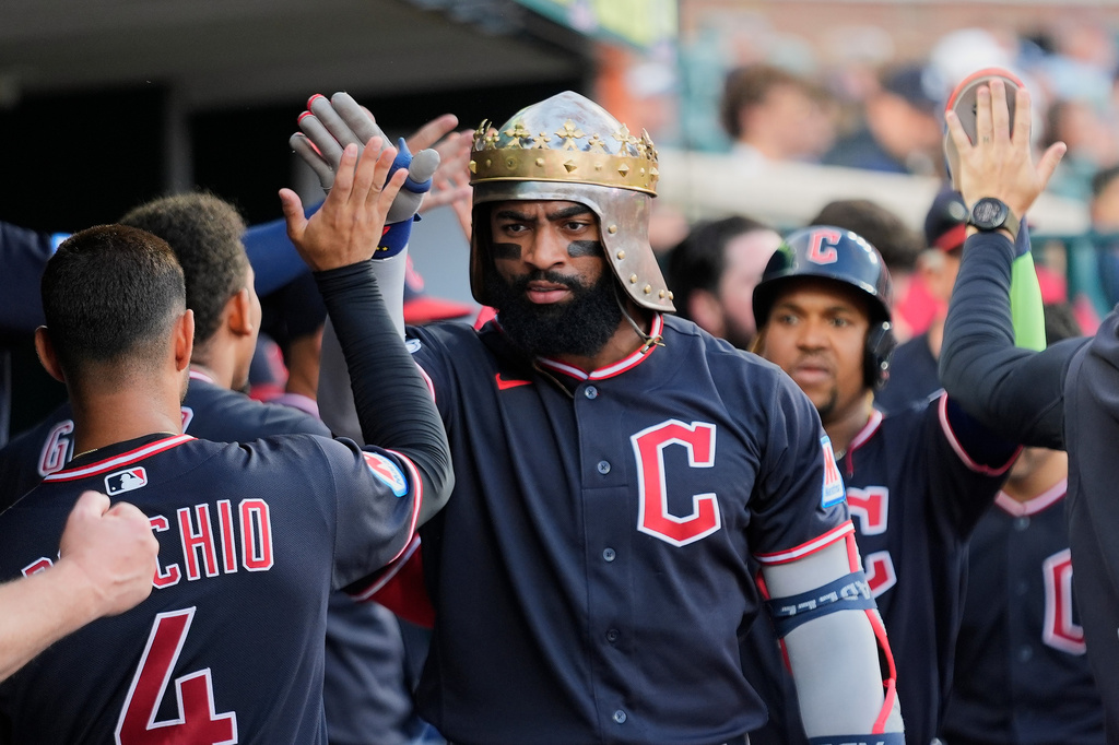 Cleveland Guardians' Jo Adell celebrates his two-run home run against the Detroit Tigers during the fifth inning of a baseball game Wednesday, Aug. 12, 2026, in Detroit. (AP Photo/Paul Sancya)