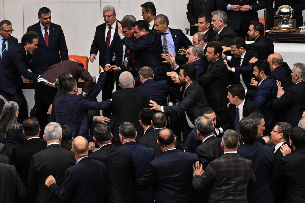 Turkey's ruling party and opposition lawmakers clash over the appointment of Istanbul Chief Prosecutor Akin Gurlek as justice minister at the parliament in Ankara, Turkey, Wednesday, Feb. 11, 2026. (Ugur Yildirim/DIA Photo via AP)