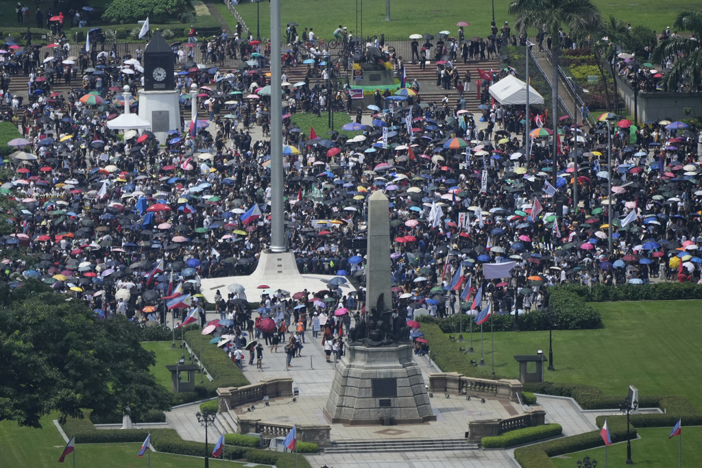 Protesters gathers during an anti-corruption rally in Manila's Rizal Park, Philippines on Sunday, Sept. 21, 2025. (AP Photo/Aaron Favila)