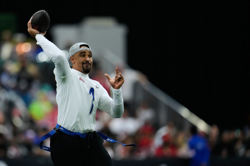 NFC quarterback Jalen Hurts (1), of the Philadelphia Eagles, passes the ball against the AFC during the first half of the NFL Pro Bowl football game, Tuesday, Feb. 3, 2026, in San Francisco. (AP Photo/Godofredo A. Vásquez)