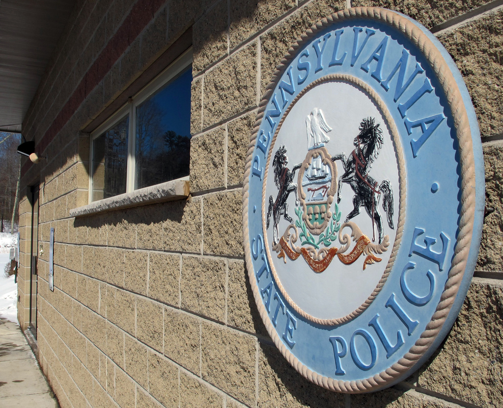 FILE - In this March 6, 2015 photo, a sign marks the location of the barracks for the Pennsylvania State Police in Blooming Grove Township, Pa. (AP Photo/Michael Rubinkam, file)