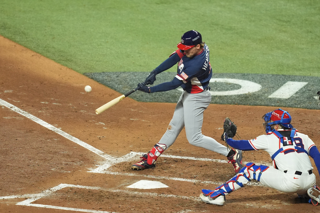 United States' Gunnar Henderson hits a home run during the fourth inning of a World Baseball Classic semifinal game against the Dominican Republic, Sunday, March 15, 2026, in Miami. (AP Photo/Rebecca Blackwell)