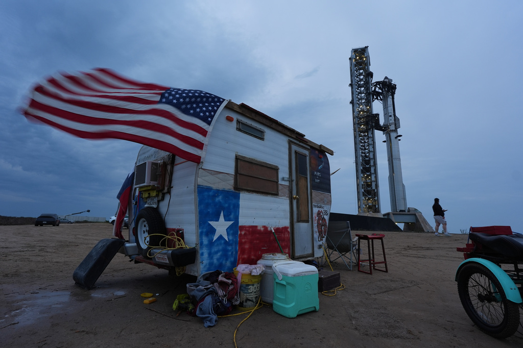 SpaceX's mega rocket Starship is prepared for a test flight from Starbase, Texas, Thursday, July 23, 2026. (AP Photo/Eric Gay)