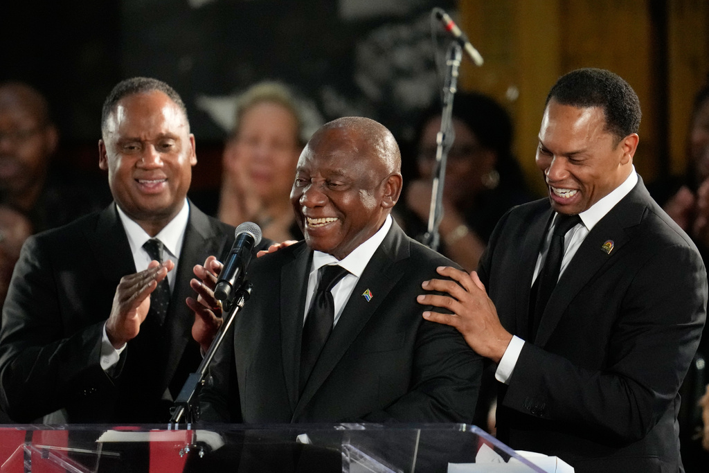 President of South Africa Cyril Ramaphosa speaks as Jonathan and Yusef Jackson look on during the Homegoing Celebration of Life for the Rev. Jesse Jackson, Saturday, March 7, 2026, at Rainbow PUSH Coalition headquarters in Chicago. (AP Photo/Erin Hooley)