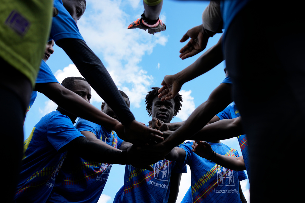 Migrants from Congo gather before a semifinal soccer match against Mali during the Kypseli Mundial in Athens, Greece, on Sunday, May 24, 2026. (AP Photo/Thanassis Stavrakis)