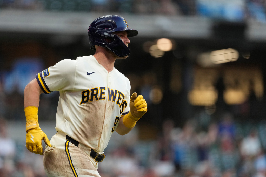 Milwaukee Brewers' Jake Bauers rounds the bases after hitting a solo home run during the fifth inning of a baseball game against the Cincinnati Reds, Tuesday, June 30, 2026, in Milwaukee. (AP Photo/Aaron Gash)