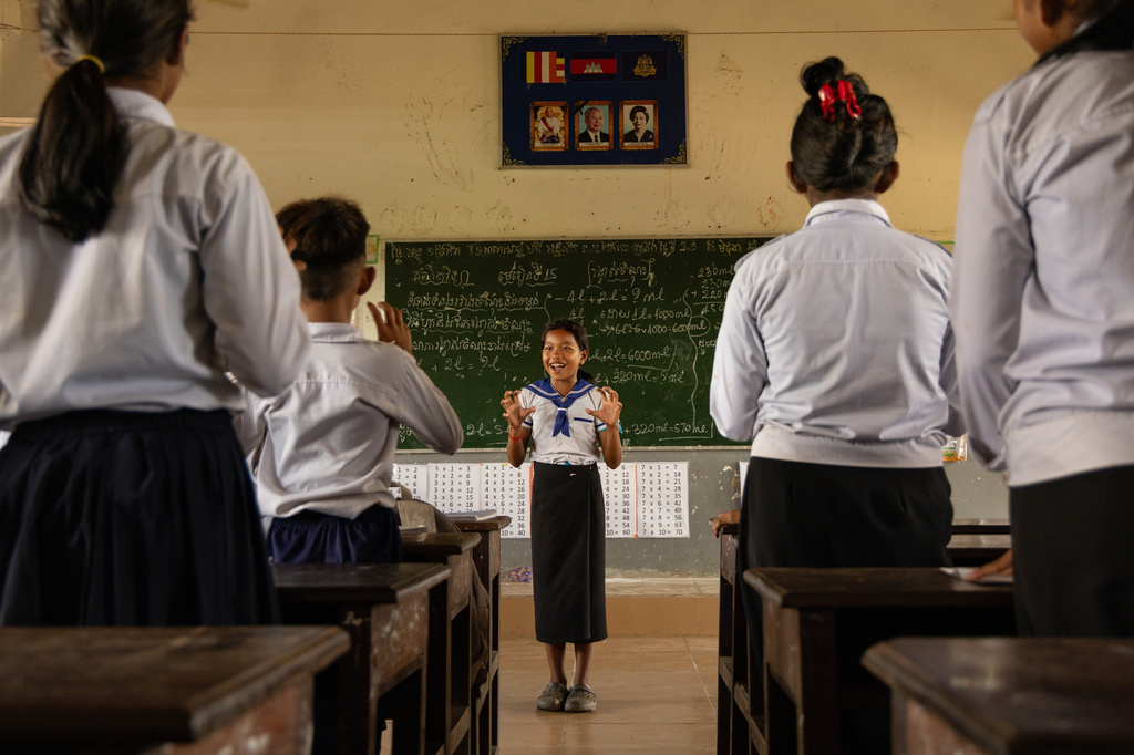 Students participate in a counting exercise at a school in one of the floating villages of Cambodia's Tonle Sap Lake on Monday, June 29, 2026. (AP Photo/Anton L. Delgado)