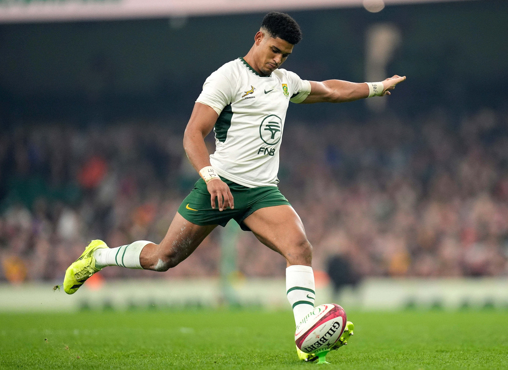 South Africa's Sacha Mngomezulu kicks a conversion during the rugby union international match between Wales and South Africa in Cardiff, Wales, Saturday Nov. 29, 2025. (Andrew Matthews/PA via AP)