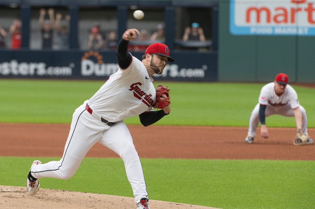 Cleveland Guardians starting pitcher Slade Cecconi delivers against the Seattle Mariners during the first inning of a baseball game, Saturday, June 27, 2026, in Cleveland. (AP Photo/Phil Long)