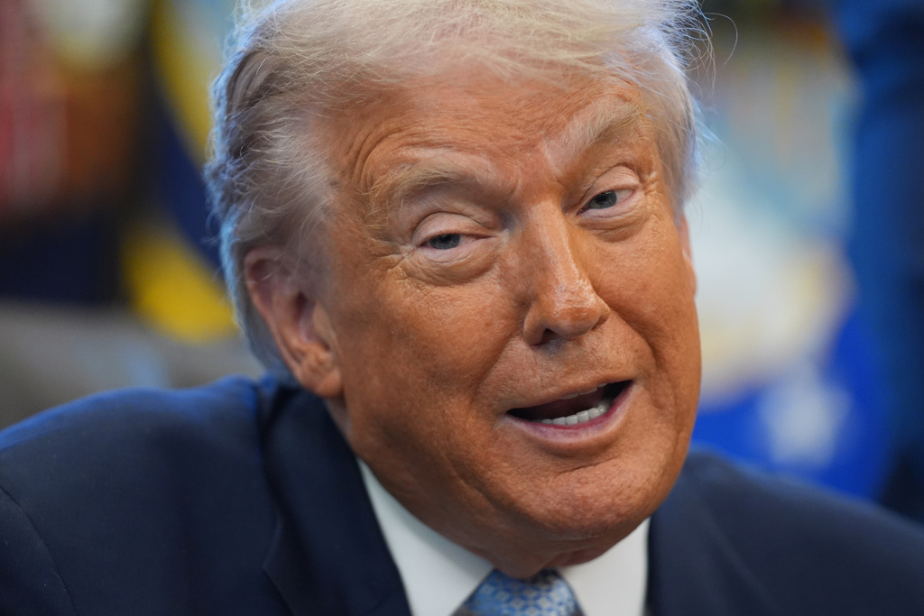 President Donald Trump speaks during a meeting with the White House task force on the 2026 FIFA World Cup in the Oval Office of the White House, Monday, Nov. 17, 2025, in Washington. (AP Photo/Evan Vucci)