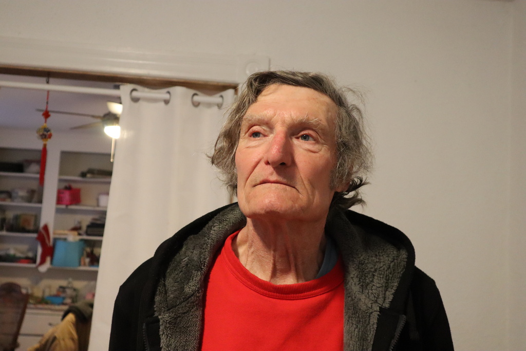 Claude Leboeuf, a clergy abuse survivor and advocate, poses at his home in Providence, R.I., Thursday, March 5, 2026, after a report by the Rhode Island attorney general detailed decades of abuse within the Catholic Diocese of Providence. (AP Photo/Leah Willingham)