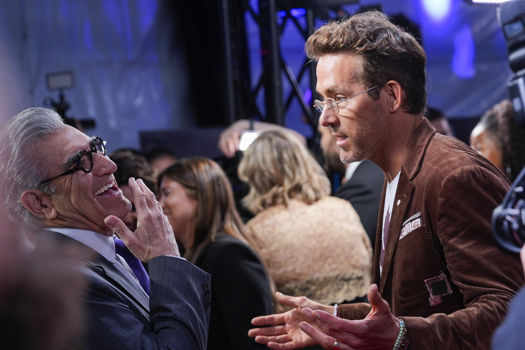 Eugene Levy, left, and Ryan Reynolds attend the premiere of "John Candy: I Like Me" during the Toronto International Film Festival on Thursday, Sept. 4, 2025, at Roy Thomson Hall in Toronto. (AP Photo/Chris Pizzello)