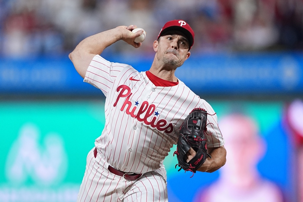FILE - Philadelphia Phillies' David Robertson pitches during the sixth inning in Game 1 of baseball's National League Division Series against the Los Angeles Dodgers, Oct. 4, 2025, in Philadelphia. (AP Photo/Matt Rourke, File)