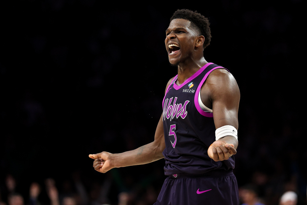 Minnesota Timberwolves guard Anthony Edwards (5) celebrates during the second half of an NBA basketball game against the Oklahoma City Thunder Friday, Dec. 19, 2025, in Minneapolis. (AP Photo/Matt Krohn)