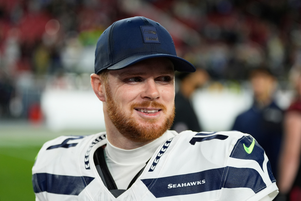 Seattle Seahawks quarterback Sam Darnold smiles after an NFL football game against the San Francisco 49ers in Santa Clara, Calif., Saturday, Jan. 3, 2026. (AP Photo/Godofredo A. Vásquez)