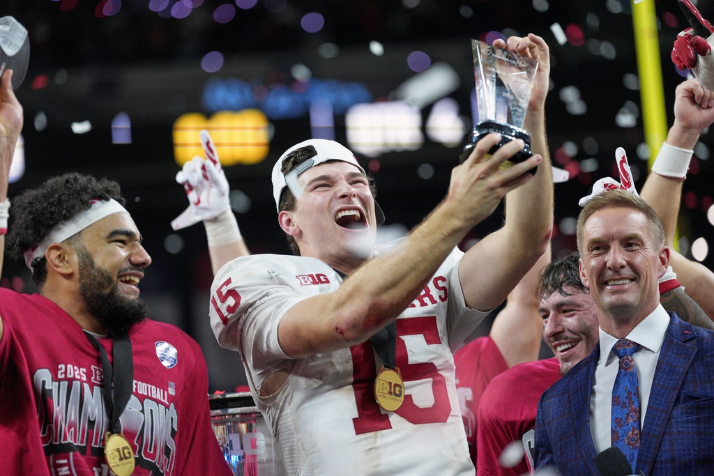 Indiana's Fernando Mendoza celebrates after the Big Ten championship NCAA college football game against Ohio State in Indianapolis, Saturday, Dec. 6, 2025. (AP Photo/AJ Mast)