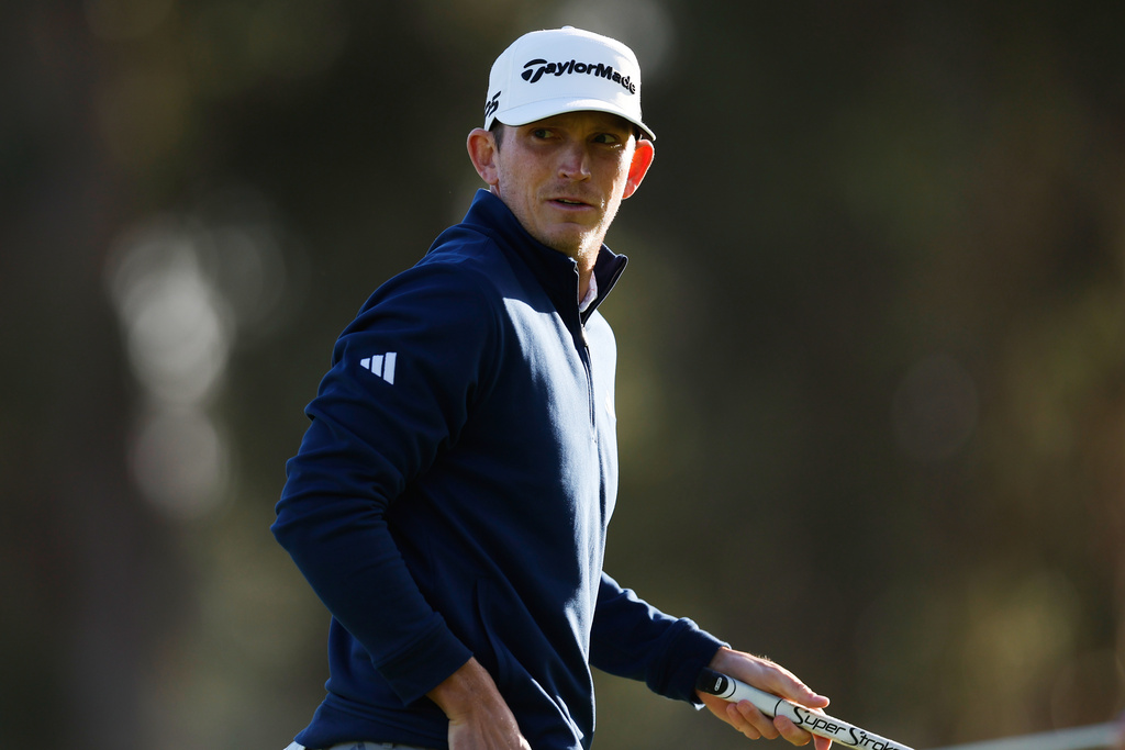 Jacob Bridgeman walks off the 18th green during the first round of the Genesis Invitational golf tournament at Riviera Country Club, Thursday, Feb. 19, 2026, in the Pacific Palisades area of Los Angeles. (AP Photo/Caroline Brehman)