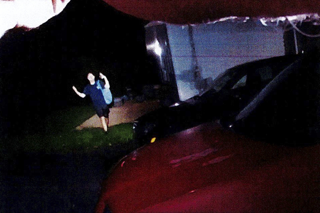 This image from body camera video released by the Montgomery County District Attorney's Office shows Glenwood Earl Pysher IV seconds before he was shot on Sunday, Aug. 23, 2026, in Norristown, Pa. (Montgomery County District Attorney's Office via AP)