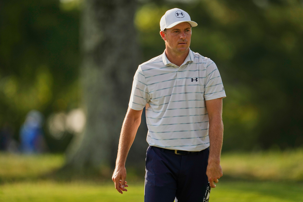 Jordan Spieth walks across the first green during the first round of the St. Jude Championship golf tournament Thursday, Aug. 13, 2026, in Memphis, Tenn. (AP Photo/George Walker IV)