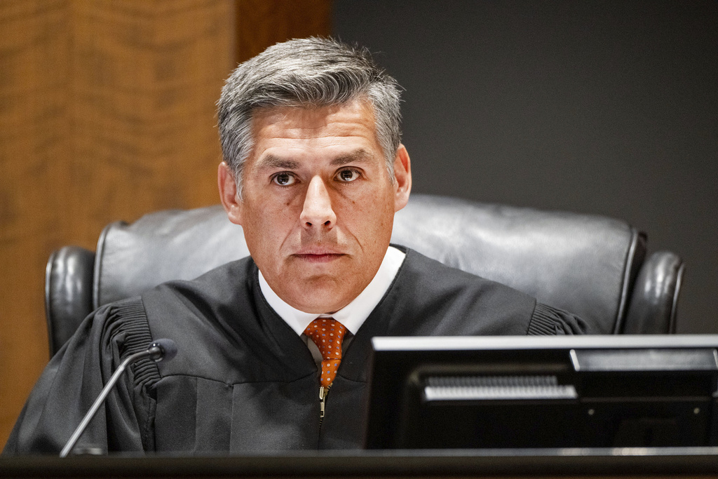 Judge Tony Graf listens to attorney Greg Skordas, who appeared on behalf of Utah County, as Tyler James Robinson, accused of fatally shooting Charlie Kirk, attends a virtual court hearing from prison on Tuesday, Sept. 16, 2025, in Provo, Utah. (Scott G Winterton/The Deseret News via AP, Pool)
