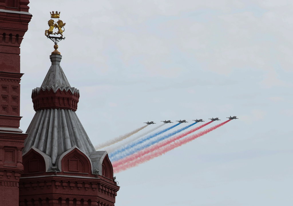Russia's Su-25 jet aircraft release smoke in the colours of the Russian state flag during the Victory Day military parade in Moscow, Saturday, May 9, 2026, during celebrations of the 81st anniversary of the Soviet Union's victory over Nazi Germany during the World War II. (Shamil Zhumatov/Pool Photo via AP)