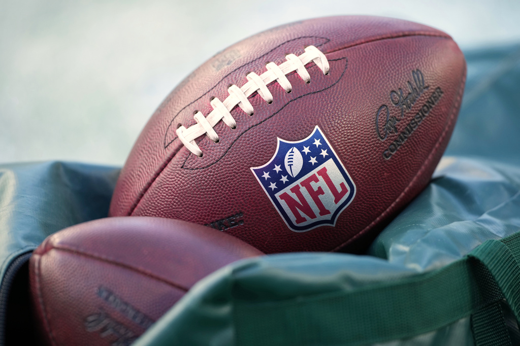 FILE - Footballs are seen before an NFL football game in Philadelphia on Jan. 4, 2026. (AP Photo/Matt Slocum, File)