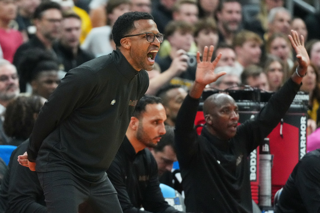 FILE -Miami head coach Jai Lucas yells from the sidelines during the first half in the first round of the NCAA college basketball tournament against Missouri, Friday, March 20, 2026, in St. Louis. (AP Photo/Jeff Roberson, File)