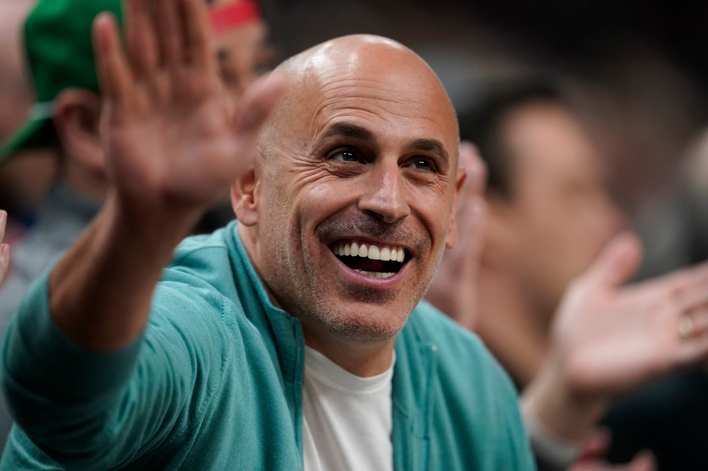 FILE - Minnesota Timberwolves co-owner Marc Lore cheers during the first half of an NBA basketball game against the New Orleans Pelicans, April 9, 2023, in Minneapolis. (AP Photo/Abbie Parr, File)