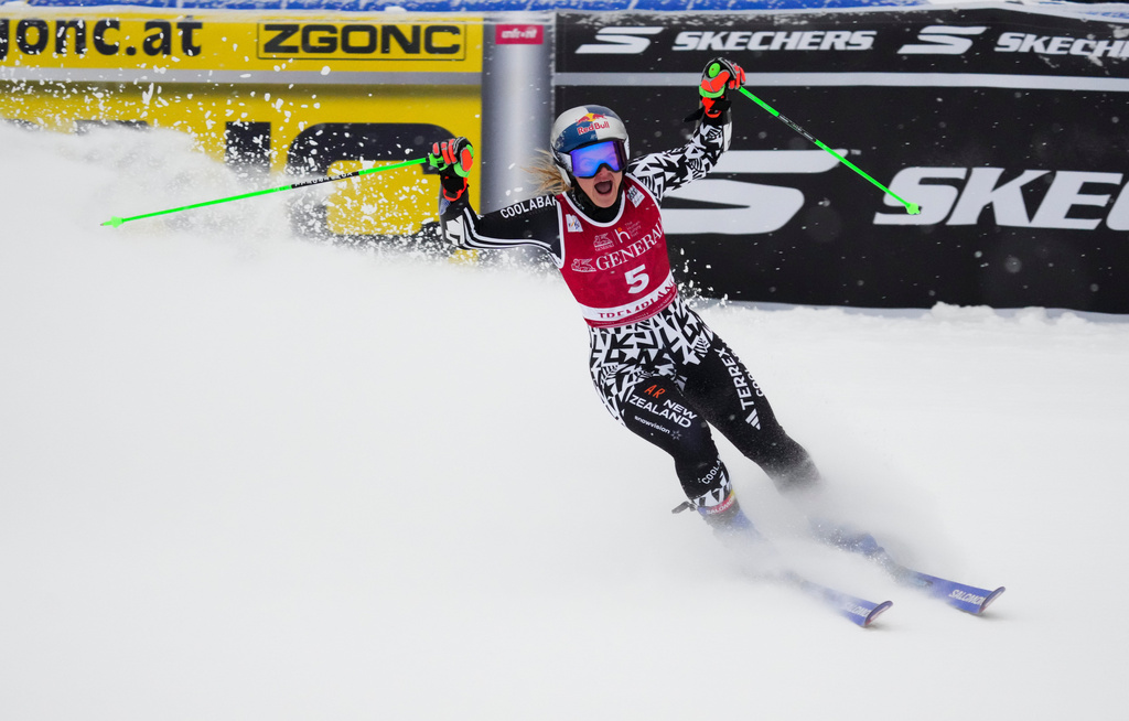 Alice Robinson, of New Zealand, celebrates her first place finish in the women's World Cup giant slalom in Mont Tremblant, Quebec, Saturday, Dec. 6, 2025. (Sean Kilpatrick/The Canadian Press via AP)