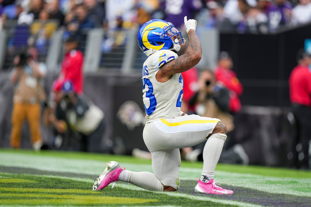 Los Angeles Rams running back Kyren Williams reacts after scoring a touchdoown on a run against the Baltimore Ravens during the second half of an NFL football game Sunday, Oct. 12, 2025, in Baltimore. (AP Photo/Stephanie Scarbrough)
