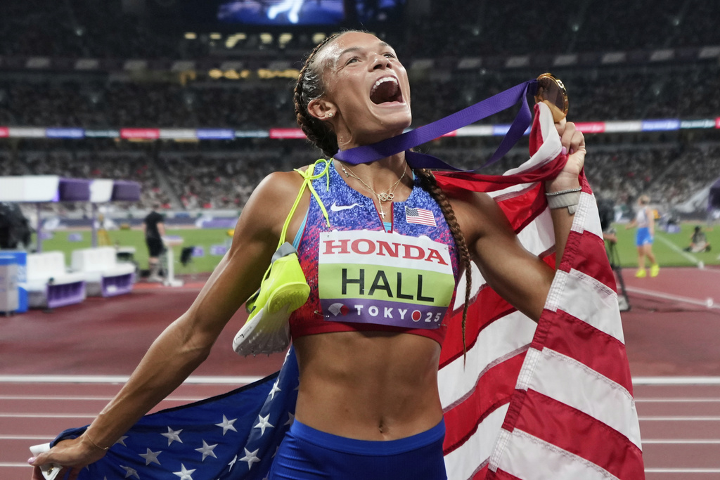 United States' Anna Hall reacts after winning the heptathlon 800 meters at the World Athletics Championships in Tokyo, Saturday, Sept. 20, 2025. (AP Photo/Eugene Hoshiko)