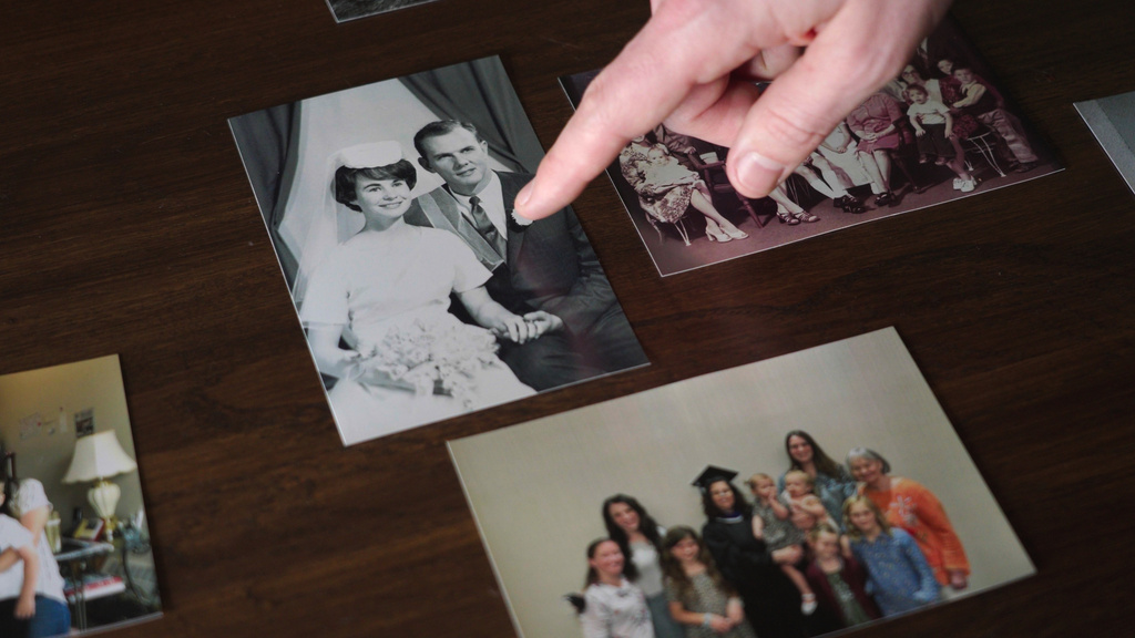 This image made from video shows Zach Loud pointing at a photo of his Canadian grandmother at his family's home in Farmington, Minn., April 17, 2026. (AP Photo/Mark Vancleave)