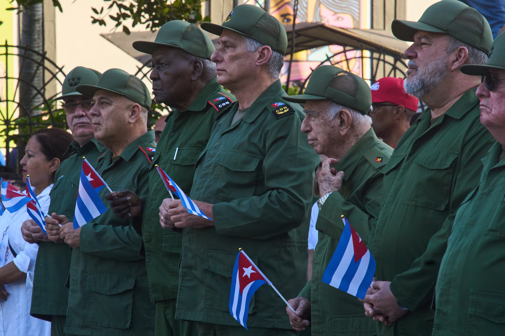 Cuban President Miguel Diaz-Canel, center, attends a celebration marking the 65th anniversary of the proclamation declaring the Cuban Revolution socialist, in Havana, Cuba, Thursday, April 16, 2026. (AP Photo/Ramon Espinosa)