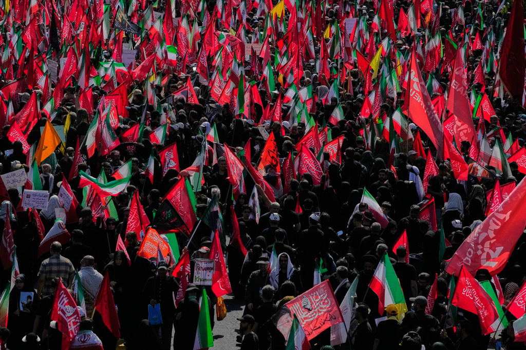 Mourners attend the funeral procession of the late Iranian Supreme Leader Ayatollah Ali Khamenei in Tehran, Iran, Monday, July 6, 2026. (AP Photo/Vahid Salemi)
