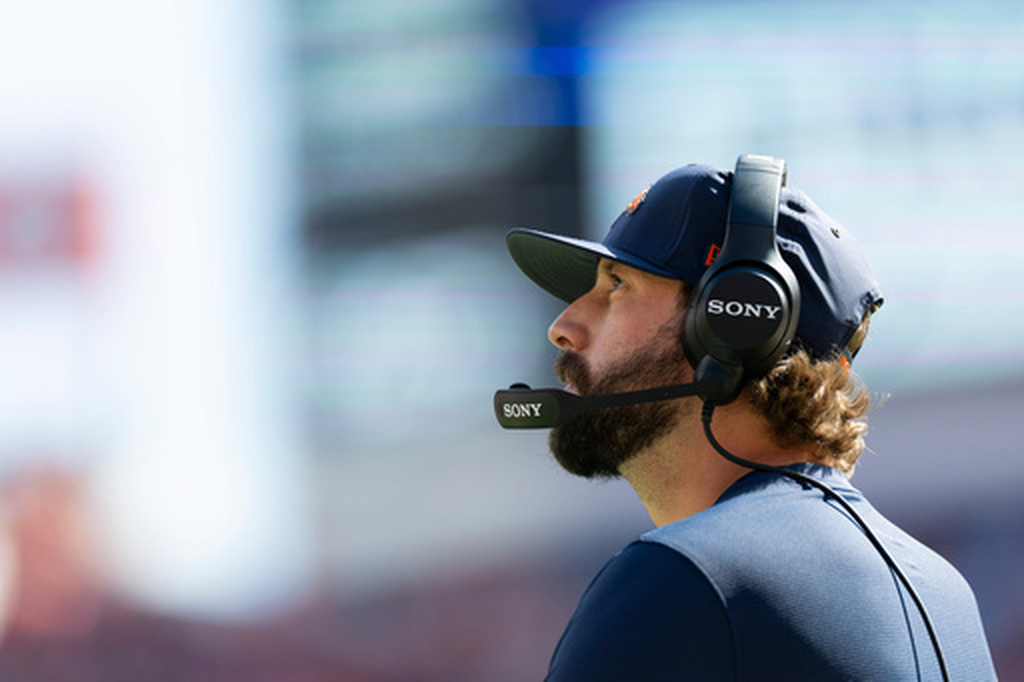 Denver Broncos offensive coordinator Davis Webb looks up during an NFL football game against the Jacksonville Jaguars, Sunday, Sept. 20, 2026 in Denver. (Gabriel Christus/Denver Broncos via AP)