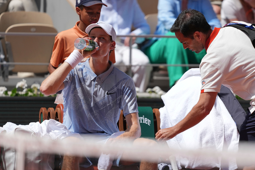 Jannik Sinner of Italy drinks during a break at the second round men's singles tennis match against Juan Manuel Cerundolo of Argentina at the French Open tennis tournament in Paris, Thursday, May 28, 2026. (AP Photo/Thibault Camus)