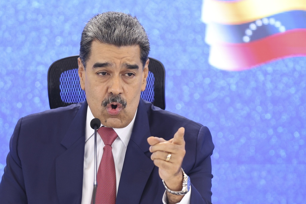 Venezuelan President Nicolas Maduro gives a press conference in Caracas, Venezuela, Monday, Sept 15, 2025. (AP Photo/Jesus Vargas)