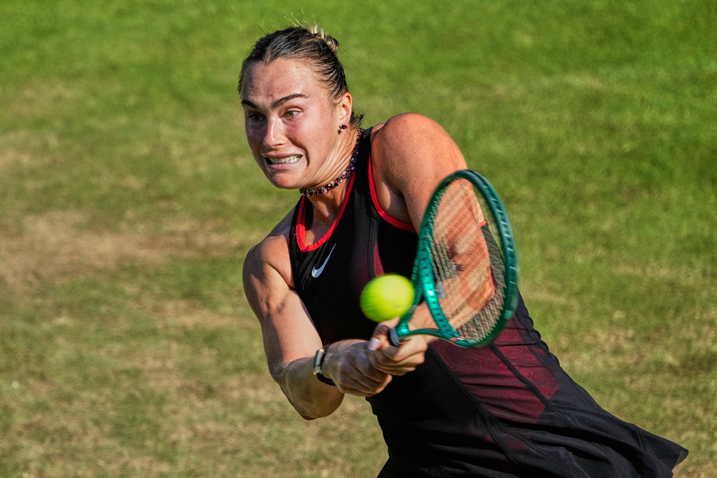 Aryna Sabalenka of Belarus returns the ball as she plays against Nikola Bartunkova of Czech Republic during their women's singles quarter-final match at the WTA 500 Berlin Open tennis tournament at the Steffi Graf Stadium, in Berlin, Germany, Friday, June 19, 2026. (AP Photo/Ebrahim Noroozi)