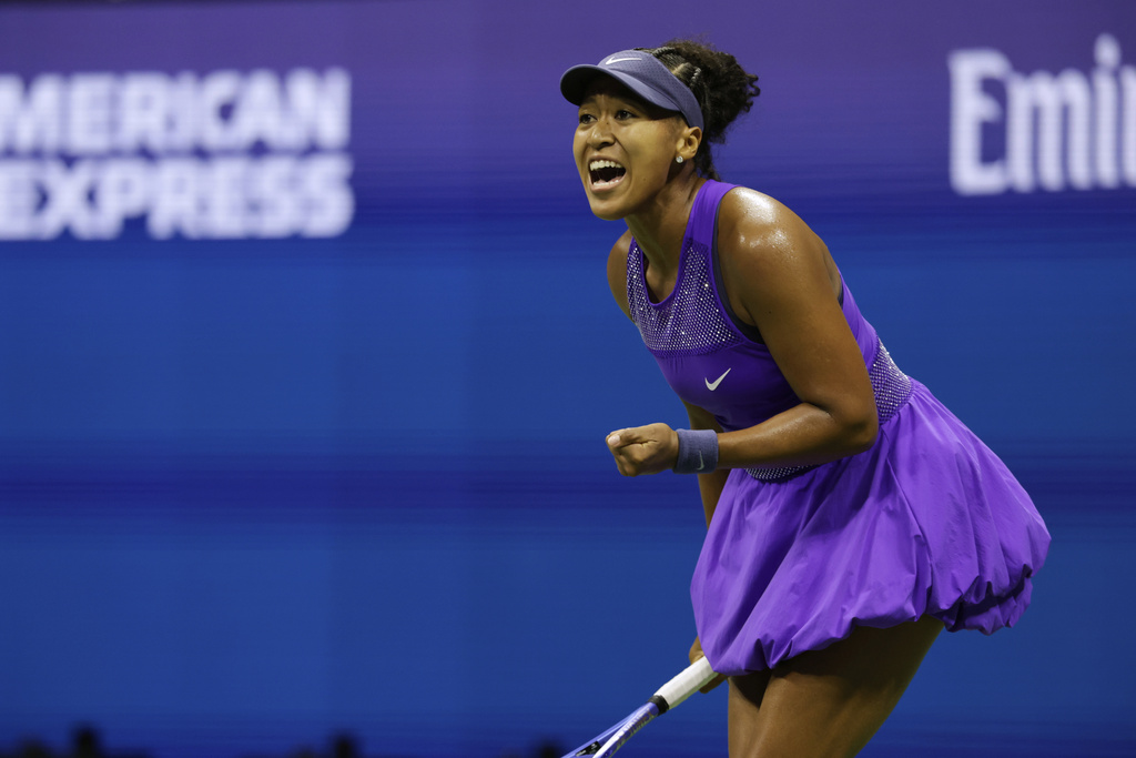 Naomi Osaka, of Japan, reacts during a match against Karolina Muchova, of the Czech Republic, at the quarterfinal round of the U.S. Open tennis championships, Wednesday, Sept. 3, 2025, in New York. (AP Photo/Adam Hunger)
