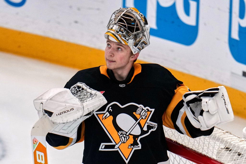 Pittsburgh Penguins goaltender Sergei Murashov looks at the scoreboard during the first period of an NHL hockey game against the Los Angeles Kings in Pittsburgh, Sunday, Nov. 9, 2025. (AP Photo/Gene J. Puskar)
