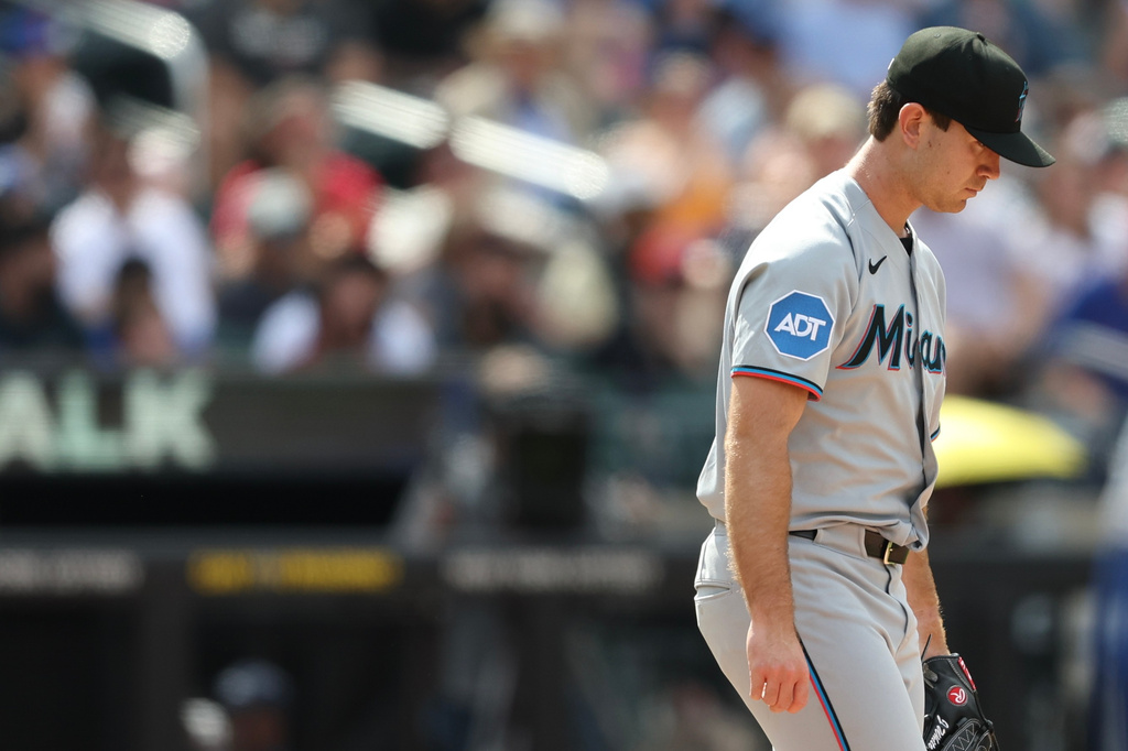 Miami Marlins pitcher Josh White walks back to the mound during the sixth inning of a baseball game against the New York Mets, Sunday, May 31, 2026, in New York. (AP Photo/Heather Khalifa)