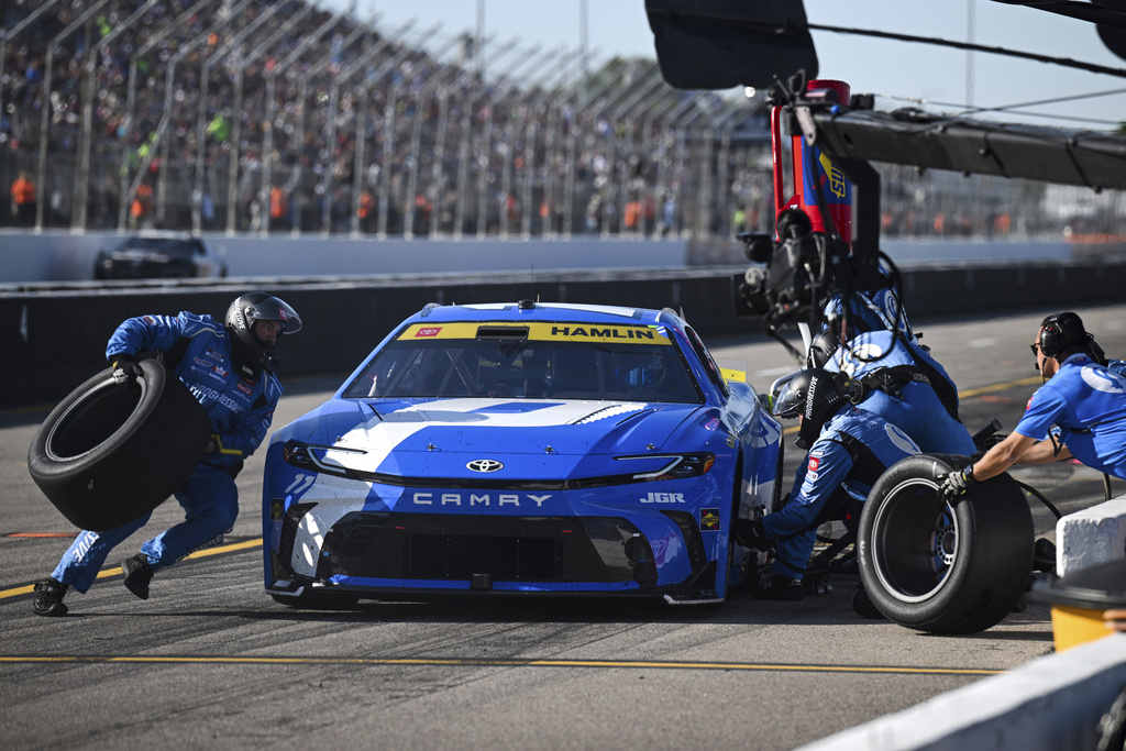 Denny Hamlin pits during a NASCAR Cup Series auto race at World Wide Technology Raceway, Sunday, Sept. 7, 2025, in Madison, Ill. (AP Photo/Connor Hamilton)