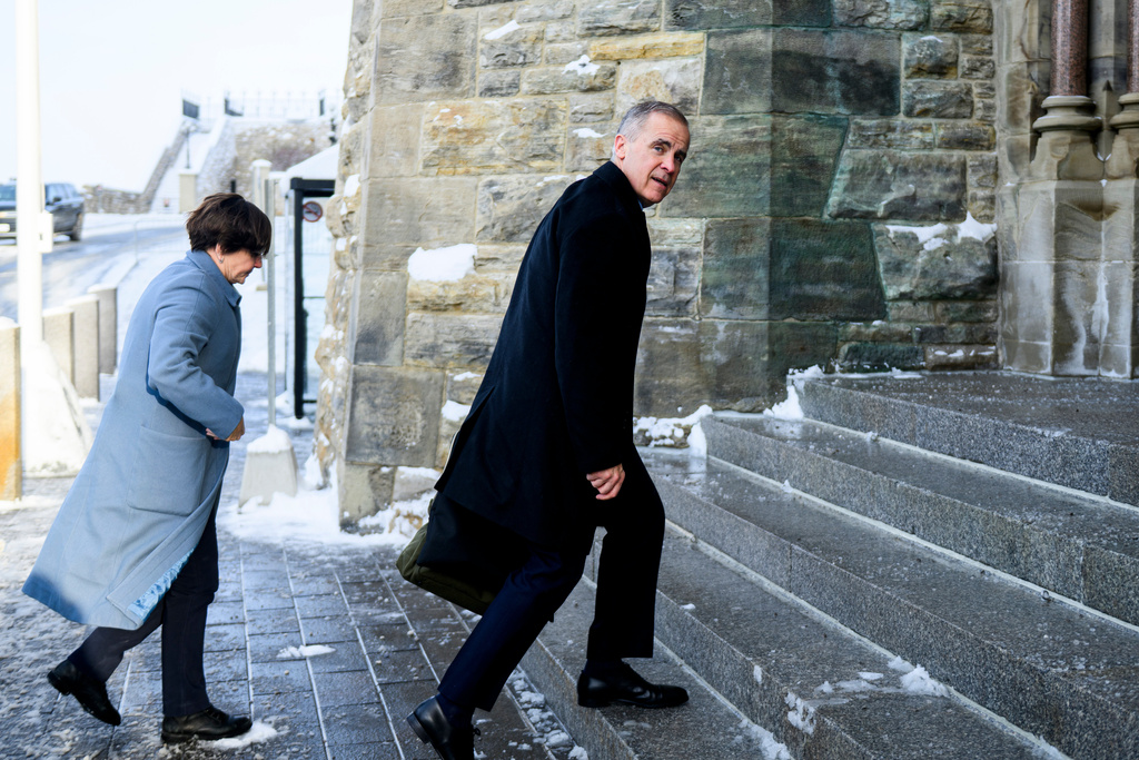 Canadian Prime Minister Mark Carney arrives on Parliament Hill in Ottawa, Canada, Thursday, Dec. 11, 2025. (Spencer Colby/The Canadian Press via AP)