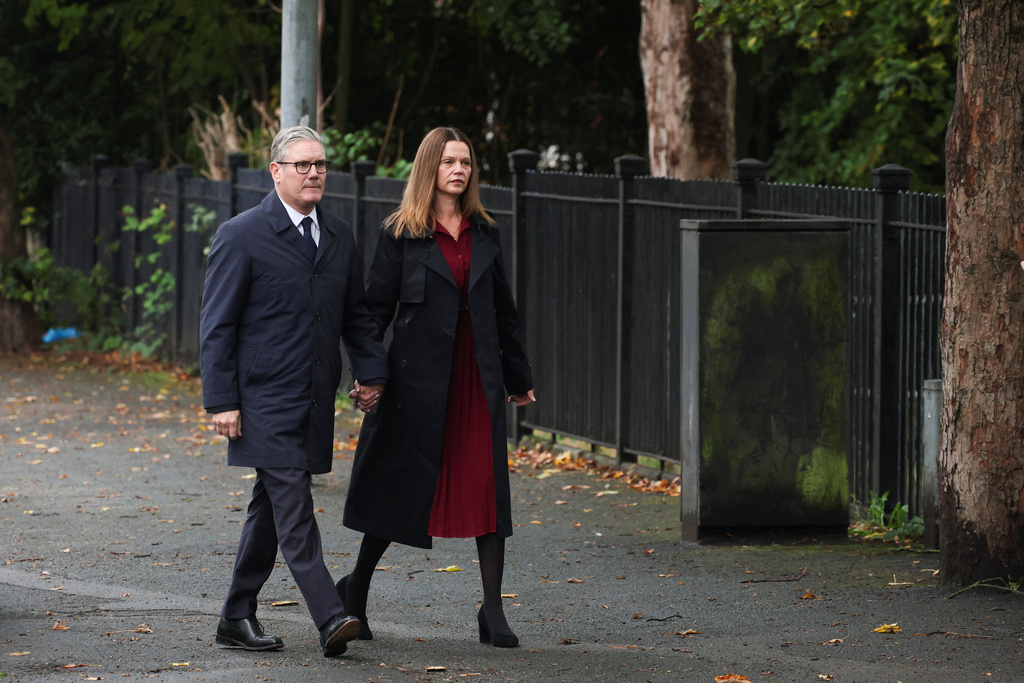 Britain's Prime Minister Keir Starmer and his wife Victoria arrive to visit the Heaton Park Hebrew Congregation synagogue in Manchester, England, Friday, Oct. 3, 2025, where multiple people were killed Thursday on Yom Kippur in what police have declared a terrorist incident. (Phil Noble/Pool Photo via AP)