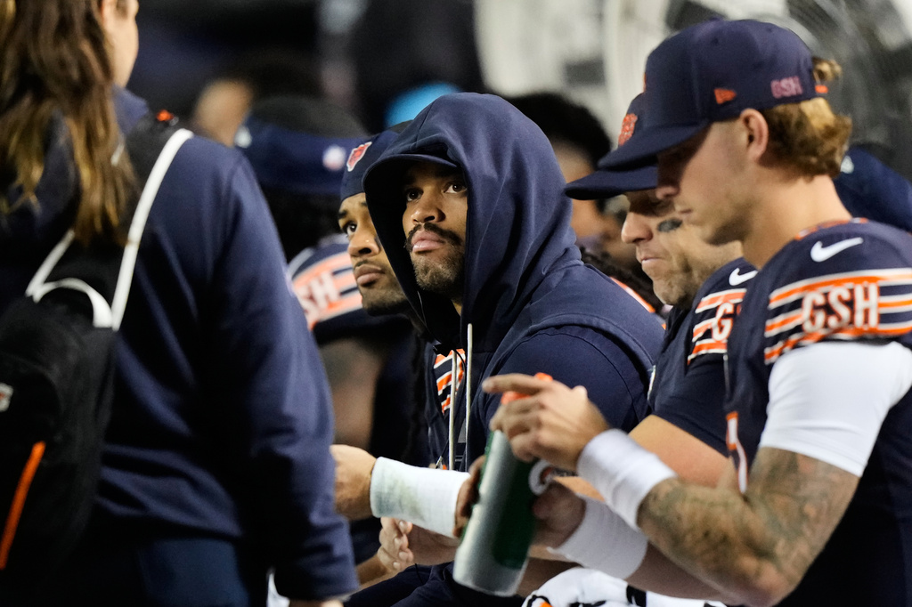 Chicago Bears quarterback Caleb Williams, center, sits on the bench during the second half of an NFL football game against the Philadelphia Eagles in Chicago, Monday, Sept. 28, 2026. (AP Photo/Nam Y. Huh)