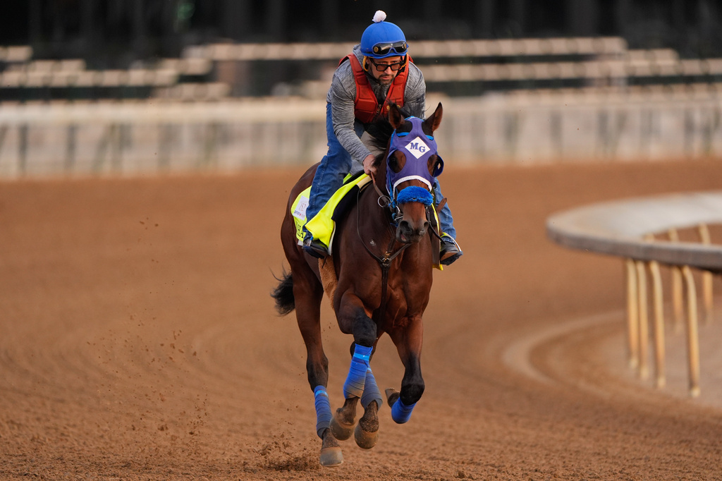 Kentucky Derby entrant So Happy works out at Churchill Downs Monday, April 27, 2026, in Louisville, Ky. (AP Photo/Charlie Riedel)