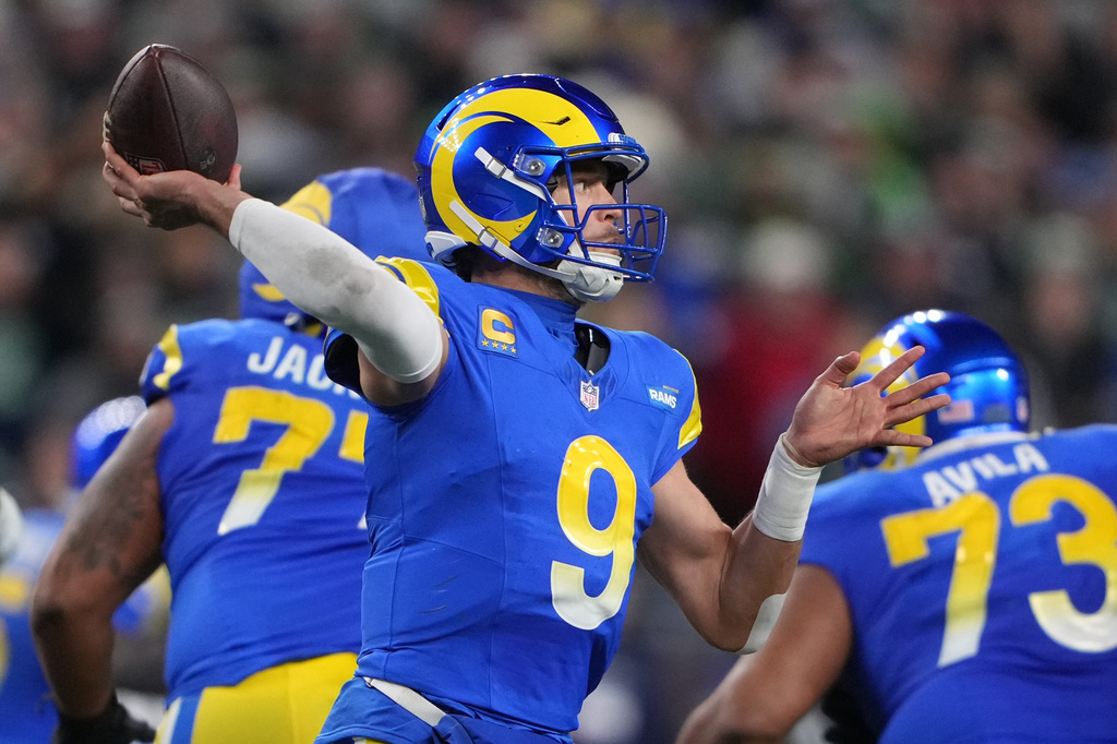 Los Angeles Rams quarterback Matthew Stafford (9) throws during the second half of an NFL football game against the Seattle Seahawks, Thursday, Dec. 18, 2025, in Seattle. (AP Photo/Lindsey Wasson)