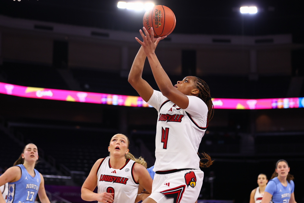 Louisville forward MacKenly Randolph (4) shoots during the second half of an NCAA college basketball game in the semifinals of the Atlantic Coast Conference tournament against North Carolina, Saturday, March 7, 2026, in Duluth, Ga. (AP Photo/Colin Hubbard)