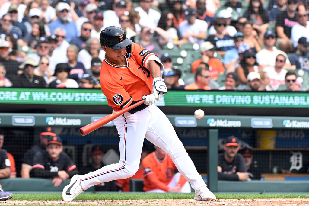 Detroit Tigers' Hao-Yu Lee hits an RBI double during the fourth inning of a baseball game against the Colorado Rockies, Saturday, Sept. 12, 2026, in Detroit. (AP Photo/Jose Juarez)