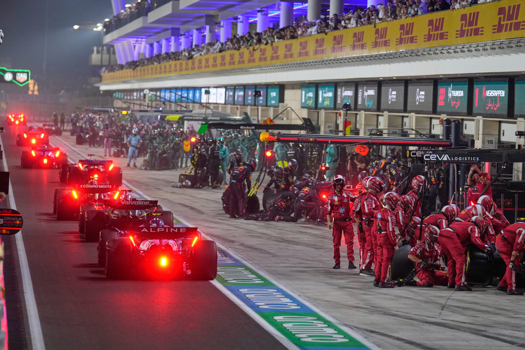 Cars exit the pitlane during a safety car session at the Qatar Formula One Grand Prix in Lusail, Qatar, Sunday, Nov. 30, 2025.(AP Photo/Altaf Qadri, Pool)